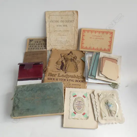 A dance card booklet, antique cards and assorted needlework and knitting books